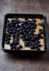 Homemade Blueberries Cake. Rustic stone background. Close up.