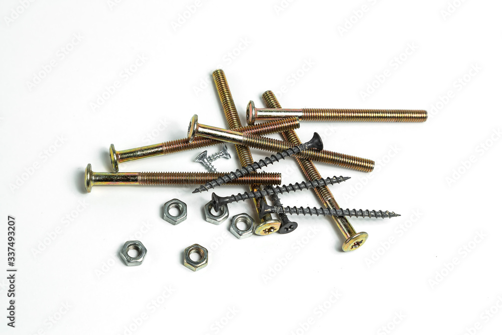 Wall mural screws and nuts on white isolated background