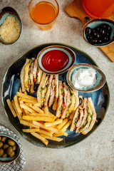 club sandwich with french fries