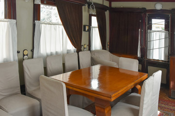 Vintage interior of a luxury  carriage in a retro train. The beginning of the 20th century