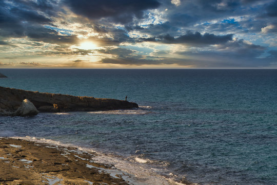 Fisherman on the Rocks on the shore in Orga - North Cyprus
