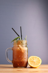 tarragon and citrus cocktail. lemonad concept. non alcoholic citrus summer drinks with citrus on...