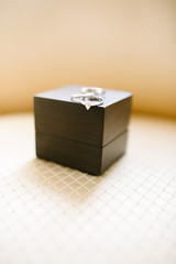 Diamond rings and wedding rings. Wedding accessories and preparations for the wedding day.
