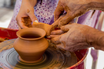 pottery art creation of pot of clay