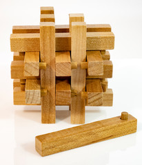 Isolated wood puzzle thinking concept.