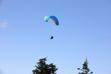 Vancouver, America - August 18, 2019: Paragliding tour at Grouse Mountain, Vancouver, America