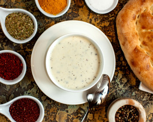 creamy soup with various dried herbs