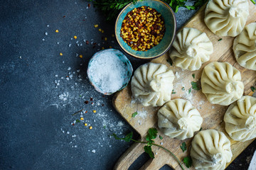 Traditional georgian khinkali dish on stone background