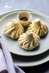 Traditional georgian khinkali dish on stone background
