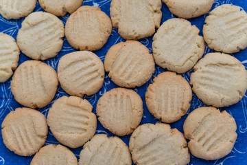 Pattern made of cookies on the blue