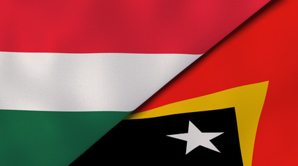 The flags of Hungary and East Timor. News, reportage, business background. 3d illustration