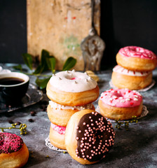 Obraz na płótnie Canvas donuts with various topping and coffee