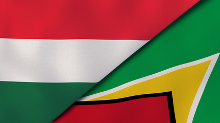 The flags of Hungary and Guyana. News, reportage, business background. 3d illustration