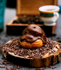eclair topped with melted chocolate