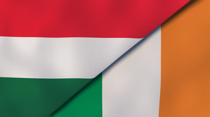 The flags of Hungary and Ireland. News, reportage, business background. 3d illustration