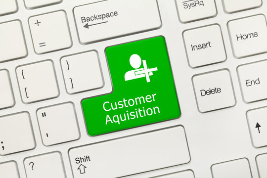 White conceptual keyboard - Customer Aquisition (green key)