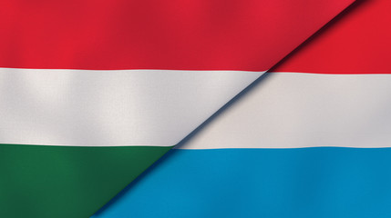 The flags of Hungary and Luxembourg. News, reportage, business background. 3d illustration