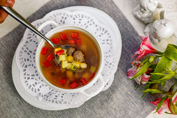 soup with vegetables and meatballs for lunch
