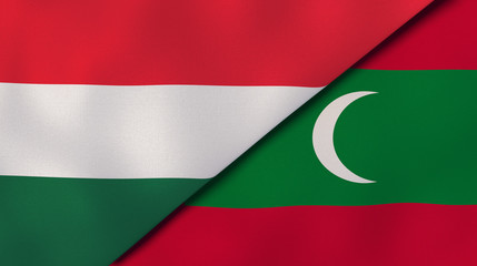 The flags of Hungary and Maldives. News, reportage, business background. 3d illustration