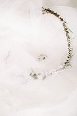 Bride hair crown. Inside the gift box. The wedding day. Bride's wedding rings