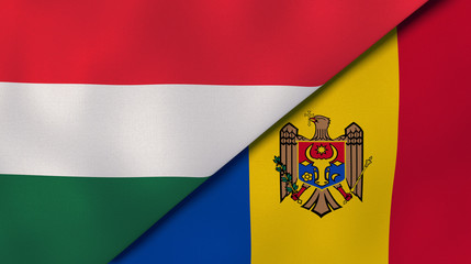 The flags of Hungary and Moldova. News, reportage, business background. 3d illustration