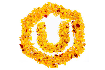 Letter U In Spring Flower Petal Hexagon. Marigold petal alphabet isolated on white background.