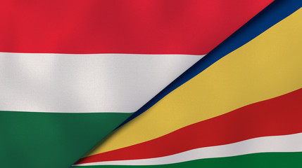 The flags of Hungary and Seychelles. News, reportage, business background. 3d illustration