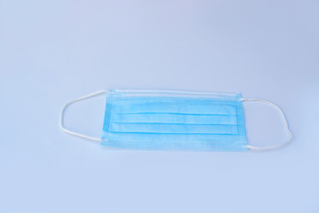 Soft focus of the mask on grey background. Healthy care concept and take care your body for protection from virus, bacteria and microbes.