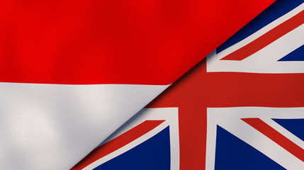 The flags of Indonesia and United Kingdom. News, reportage, business background. 3d illustration