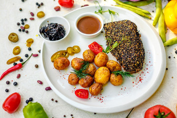 Pepper Steak with Baked Potatoes Pickled Onion and Vegetable Sauce