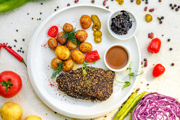 Pepper Steak with Baked Potatoes Pickled Onion and Vegetable Sauce