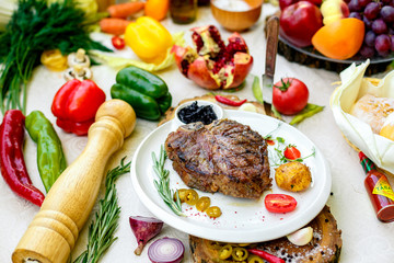 juicy barbecue steak with pickled onions and jalapeno on a white plate
