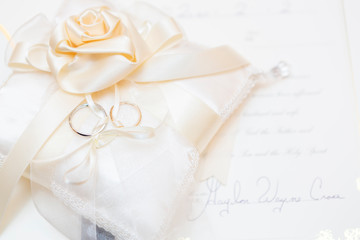 wedding rings on a pillow