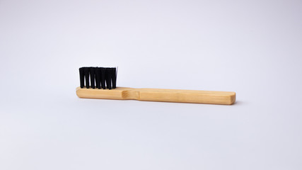 wooden brushes for cleaning shoes on the white background.