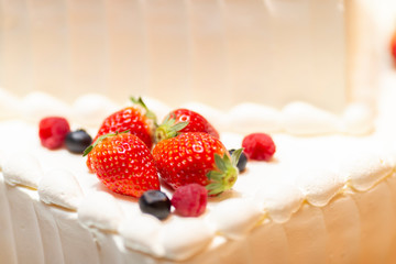 Strawberries and blueberries on the cake