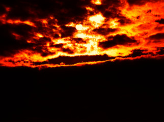 Burning sunset with high altitude clouds background