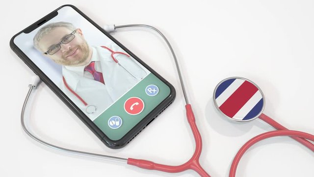 Physician on the screen of smartphone and the stethoscope with flag of Costa Rica. Costa Rican telemedicine
