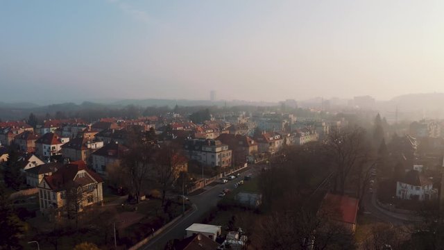 The Peaceful City Of Prague, Czechia, drone flight over villas, mansions and historic architecture During Golden Hour - Aerial Shot