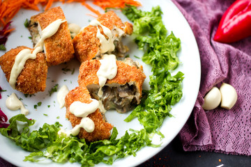 fried roll filled with mushroom and cheese