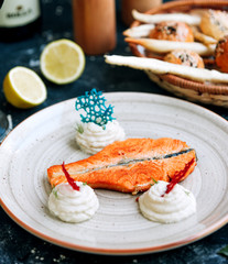 fried salmon fillet with sour cream