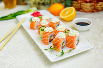 Sushi Philadelphia with soy sauce and chopsticks