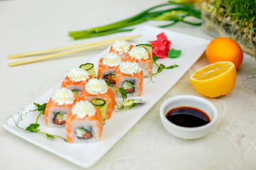 Sushi Philadelphia with soy sauce and chopsticks