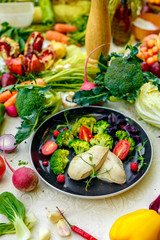 diet food, boiled chicken breast with broccoli and tomatoes on a decorated table