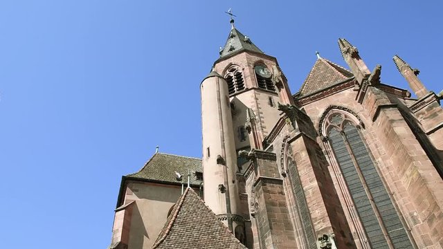 St. George's Church in Alsace Haguenau low angle view with bells song during Covid-19 Coronavirus outbreak in France