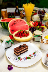 cake with biscuitly chocolate tenderness, a glaze made from natural high-quality Belgian chocolate and a delicate chocolate cream