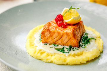 fried fish with mashed potatoes and cream sauce