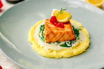 fried fish with mashed potatoes and cream sauce