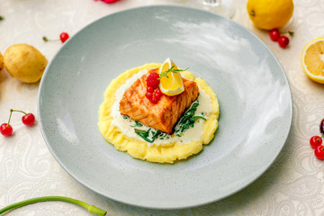 fried fish with mashed potatoes and cream sauce