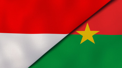 The flags of Indonesia and Burkina Faso. News, reportage, business background. 3d illustration