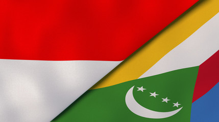 The flags of Indonesia and Comoros. News, reportage, business background. 3d illustration